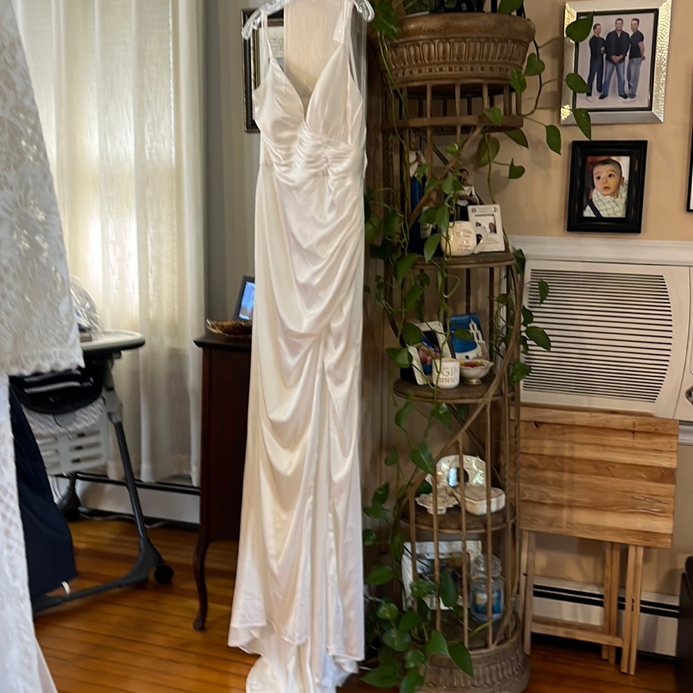 Size L. Looks smaller white wedding dress nwt
